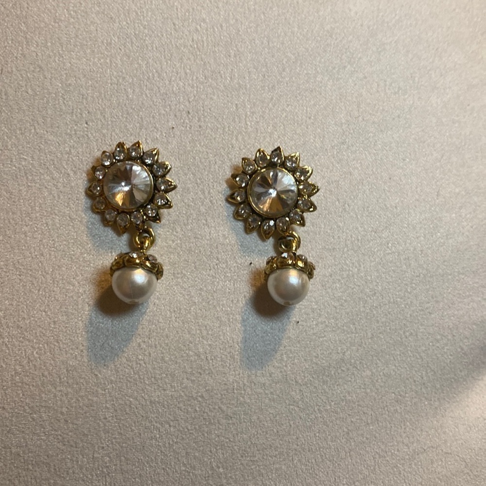 Fashion gold tone and cubic zirconia pendant earrings